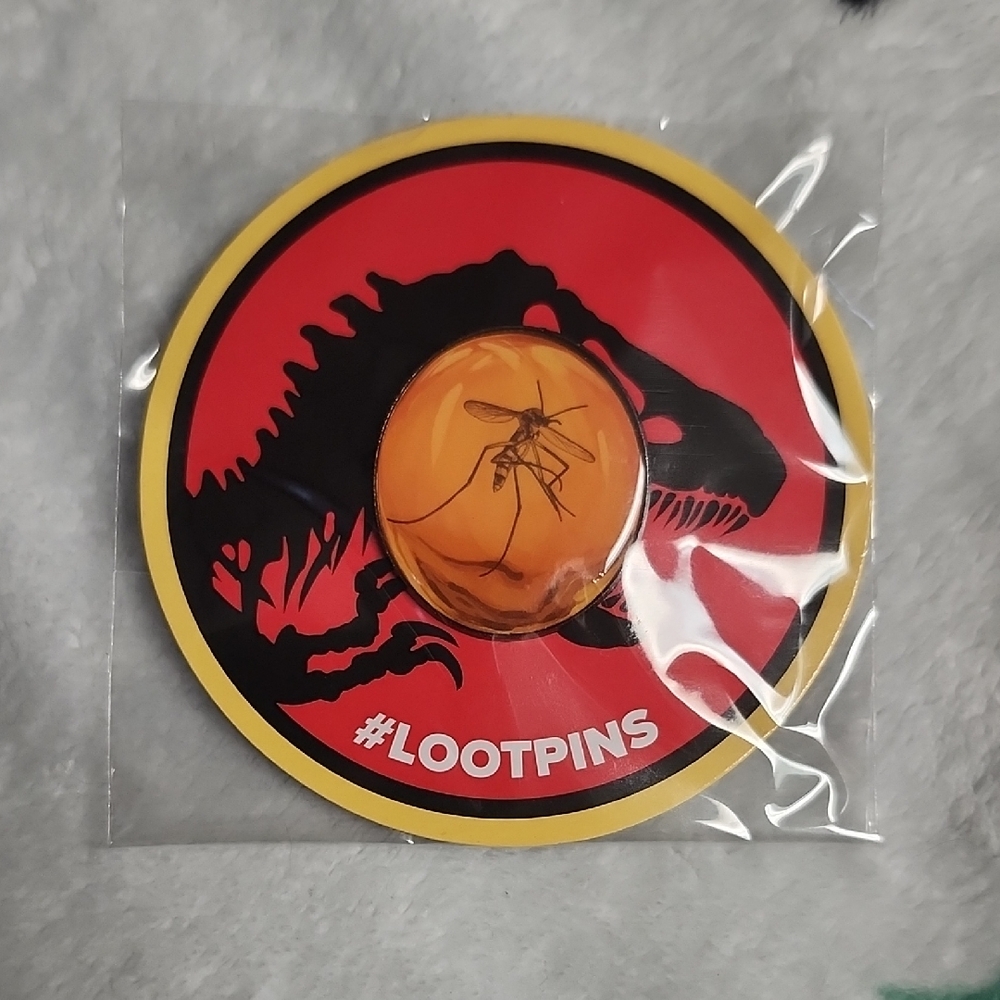 Loot Crate Red and Yellow Reptile Collectible